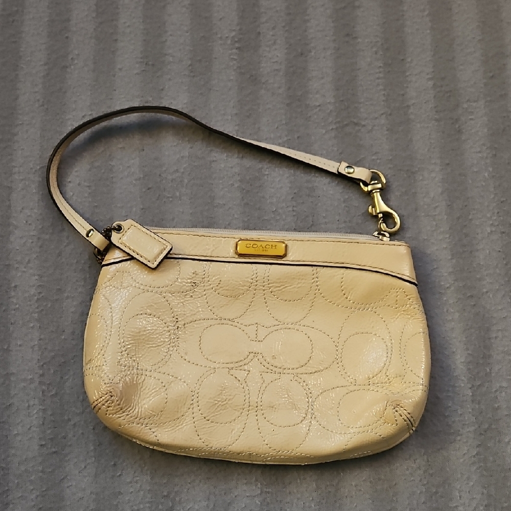 Coach Beige Wristlet with Gold Accents